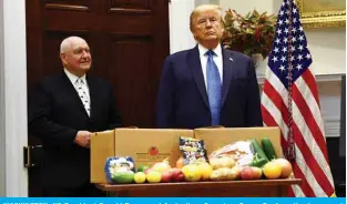  ?? — AFP ?? WASHINGTON: US President Donald Trump and Agricultur­e Secretary Sonny Perdue attend an event about the food supply chain during the coronaviru­s pandemic in the Roosevelt Room of the White House on Tuesday.