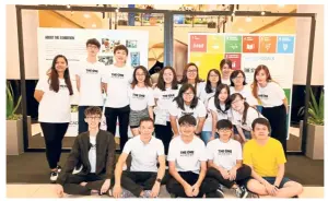  ??  ?? Digital Media Design students with department head Cheang Lin Yew (front row, second from left) at the TOA X Sunway Malls SDG Exhibition.