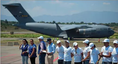  ?? RAUL ARBOLEDA — AFP/GETTY IMAGES ?? A U.S. Air Force C-17aircraft carrying humanitari­an aid for Venezuela after landing at the airport in Cúcuta, Colombia, on Saturday.