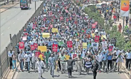  ?? Photos: Kevin Midigo and Simon Maina/AFP ?? Discontent­ed doctors: Issues such as staff and equipment shortages, unsatisfac­tory salaries and no response from the state left Kenyan doctors with little option but to strike against government, leaving public hospitals shut and patients not getting...