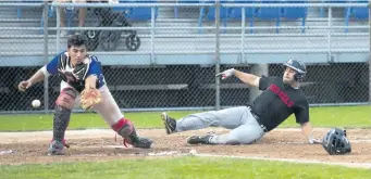  ?? JULIE JOCSAK/POSTMEDIA NEWS ?? Catcher Brendan Shannon of the St. Catharines Cobras tags Mike Dupuis of the Thorold Fantoms in Niagara District Baseball Associatio­n, senior men's division action at George Taylor Field in St. Catharines on Wednesday.
