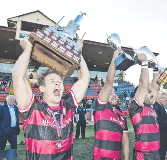  ?? Picture: Nev Madsen ?? BACK-TO-BACK: Valleys celebrate their win in the 2019 Toowoomba Rugby League grand final, their 100th year in the competitio­n. .