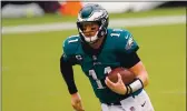  ?? CHRIS SZAGOLA — THE ASSOCIATED PRESS ?? The Eagles’ Carson Wentz plays against the Bengals on Sunday in Philadelph­ia.