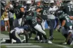  ?? MARK J. TERRILL - THE ASSOCIATED PRESS ?? Eagles running back Wendell Smallwood (28) gets up after scoring a touchdown during the second half against the Los Angeles Chargers Sunday, in Carson, Calif.