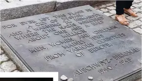  ??  ?? A ROW of granite slabs in various languages (photo shows the one in English) set up between the ruins of the crematoria in Auschwitz II in memory of the more than a million lives who perished in the Holocaust.