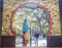  ?? ?? Diana Washburn (left) and Stephanie Moret explore Taft Gardens & Nature Preserve in July. The paths are alive with birdsong and lizards.