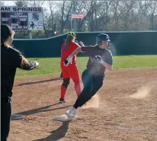  ?? Graham Thomas/Herald-Leader ?? Brooke Smith, Siloam Springs sophomore, rounds third base on her way home during the first inning of Monday’s softball game at La-Z-Boy Park.