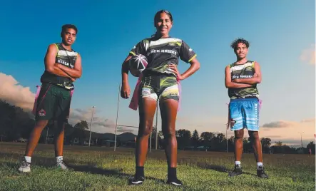  ?? Picture: SCOTT RADFORD- CHISHOLM ?? FAMILY AFFAIR: Three junior Oztag players from the same family are playing at the national Oztag championsh­ips starting today. ( From left) Kai Martin- Savage, 15, Jairel Martin- Savage, 13, and Jake Martin- Savage, 16.