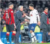  ??  ?? Jose Morinhio has a word with Dele Alli