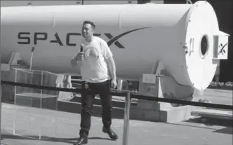  ?? THE ASSOCIATED PRESS ?? Telsa CEO Elon Musk congratula­tes the teams of the Hyperloop Pod Competitio­n II at SpaceX’s Hyperloop track in Hawthorne, Calif., Aug. 27.