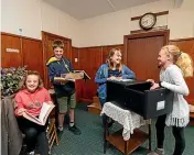  ?? SIMON O’CONNOR/STUFF ?? Zoe Reader, 11, Jackson Reader 13, Ashley Howard, 12, and Caitlin Howard, 11, gave Stratford Library’s escape room a go on Thursday.