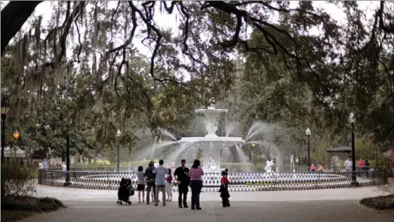  ?? DAVID GOLDMAN, THE ASSOCIATED PRESS ?? The Forsythe Park fountain in Savannah’s historic district. Lured by the city’s time-capsule collection of antebellum homes and manicured public squares, tourists spent an estimated $2.8 billion here in 2016.