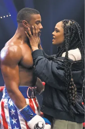  ?? Barry Wetcher / Metro Goldwyn Mayer Pictures ?? Michael B. Jordan stars as Adonis Creed, who faces the son of the Russian boxer defeated by Rocky, and Tessa Thompson stars as Bianca in “Creed II.”