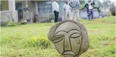  ?? ?? A stone sculpture is seen outside the home of Ong’esa.