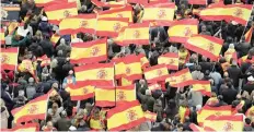  ?? | Reuters ?? PEOPLE gather during a protest called by right-wing opposition parties against Spanish Prime Minister Pedro Sanchez at Colon square, Madrid, at the weekend.