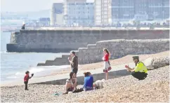  ?? GLYN KIRK/AFP via Gett y Images ?? As the U.K. coronaviru­s death toll nears 9,000, people are being urged to stay away from beaches and parks.