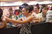  ?? PARAS GRIFFIN / GETTY IMAGES ?? Actress Amandla Stenberg pose with fans at “The Hate U Give” Atlanta red carpet screening at Regal Atlantic Station on Oct. 3.