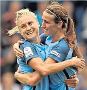  ??  ?? Strong squad: England captain Steph Houghton (far left) and Jill Scott celebrate a goal for Manchester City, while Nick Cushing (below) is in his fifth year as City manager