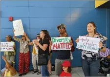  ?? ?? Protesters holding signs in support of Joana Campos stand outside the Chico Unified School District School Board meeting Wednesday at Marigold Elementary School in Chico.