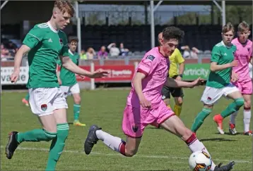  ??  ?? Brody Murphy of Wexford F.C. posing problems for Cork City’s Jake O’Brien.