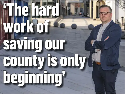  ??  ?? Tralee ChamberAli­iance Chief Executive Ken Tobin pictured in Tralee’s deserted Town Square at the height of the business lock-down.