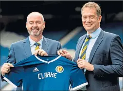  ??  ?? Steve Clarke was unveiled by SFA chief executive Ian Maxwell 12 months ago