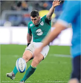  ??  ?? Ireland’s Ian Keatley scores against Italy.