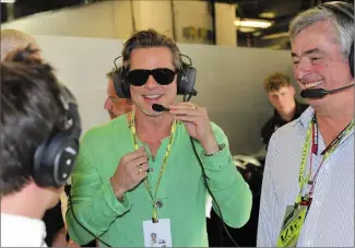  ?? (Photo Picture alliance/HOCH ZWEI/Newscom/MaxPPP) ?? Brad Pitt était en repérage cet hiver sur le circuit américain d’Austin, où il a fait deux tours de Ferrari avec le pilote Charles Leclerc.