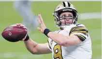  ?? BUTCH DILL THE ASSOCIATED PRESS FILE PHOTO ?? New Orleans Saints’ Drew Brees has passed for 80,358 yards in career regular-season games, making him the first NFL QB to surpass the 80,000-yard milestone. But the longtime star hasn’t committed to playing another season after this one.