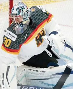  ?? FOTO: MIKKO STIG / DPA ?? Torhüter Philipp Grubauer, der in der NHL bei Seattle Kraken spielt, brachte die Slowaken mit seinen Paraden zur Verzweiflu­ng.