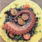  ?? PROVIDED BY HOLBOX ?? Try the tacos de pulpo – braised and fried Mexican octopus with calamari ink sofrito – at Holbox in Los Angeles.