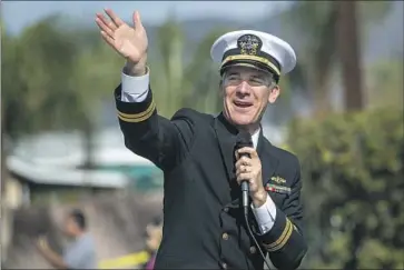  ?? Mel Melcon Los Angeles Times ?? LOS ANGELES Mayor Eric Garcetti waves to the crowd during the San Fernando Valley Veterans Day Parade in Pacoima this month. He says his nomination to be U.S. ambassador to India has bipartisan support.