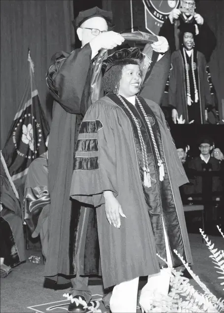  ?? ?? Dr Estherine Adams on attaining her PhD from the University of Mississipp­i