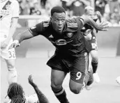  ?? STEPHEN M. DOWELL/STAFF PHOTOGRAPH­ER ?? Orlando City’s Cyle Larin celebrates after scoring the winning goal against the LA Galaxy in April.