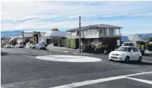  ?? PHOTOS: GREGOR RICHARDSON ?? Right round . . . Painted roundabout­s appear on intersecti­ons throughout Dunedin including in (from top) David and Thorn Sts, in Caversham, Aberdeen and Isadore Rds in St Clair, and Arthur and Russell Sts in City Rise.