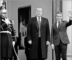  ??  ?? Macron welcomes Trump at the Elysee Palace. — Reuters photo