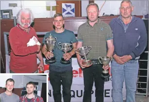  ?? a26shearin­gcomp01no ?? Left to right are Judge Neil Macphail with young farmer first prize winner Allan Mackenzie of Lochearnhe­ad, open winner (machine and handshears) James MacDonald and judge Davie Anderson.