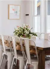  ??  ?? LIVING AND DINING Teaming white walls with natural dark timber floors has created a serene and effortless modern aesthetic that also remains true to the classic villa look.