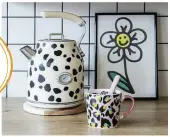  ??  ?? Marnie loves pattern so there’s plenty of it in her new-look kitchen – even on the kettle! She cut out vinyl, cow-print stickers to give her existing one a unique new look