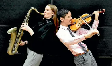  ?? KATE LEPPER ?? New Zealand School of Music students Louisa Williamson and Patrick Hayes will be playing together in the An American In Wellington concert.