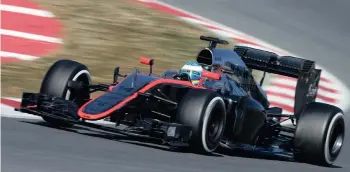  ?? DAN ISTITENE/GETTY IMAGES ?? TESTING TIME: Fernando Alonso driving shortly before his crash in Barcelona.