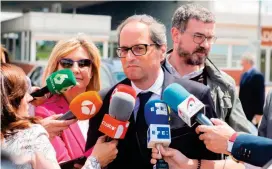  ?? FOTO EFE ?? Torra designó a Jordi Turull y Josep Rull, quienes están en prisión preventiva, como consejeros del nuevo gobierno.