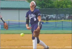  ?? STAFF PHOTO BY ANDY STATES ?? La Plata’s Alyssa Bilodeau hurls a pitch during the Warriors’ 2A state semifinal against the Eastern Tech Mavericks at Bachman Sports Complex in Glen Burnie on Wednesday. Bilodeau struck out 12 in the Warriors’ 3-2, eight-inning win.