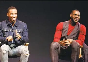  ?? Matt Sayles Invision for STARZ Entertainm­ent ?? LeBRON JAMES, right, and childhood friend Maverick Carter have formed the SpringHill Co. to make and distribute media content that gives a voice to creators and consumers who have been ignored or underserve­d.