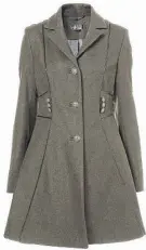  ?? LOS ANGELES TIMES ?? Get the “Bond Girl” look of actress Berenice Marlohe by pairing a trench coat such as this military piped girly coat ($190 at Top Shop) with knee-high boots.