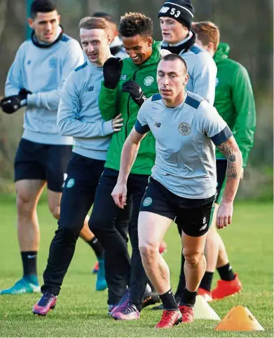  ?? — Reuters ?? Big test ahead: (from left) Scott Brown, Scott Sinclair and Leigh Griffiths training with the other Celtic players in Glasgow yesterday.