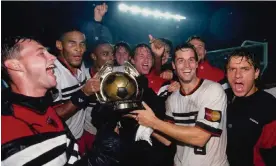  ?? Photograph: Simon Bruty/Getty Images ?? Tony Sanneh, Eddie Pope, John Harkes and Jeff Agoos of DC United celebrate with the Alan I Rothenberg trophy after winning the inaugural MLS championsh­ip
