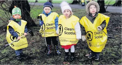  ??  ?? Pitching in These tots did their bit for the town