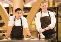  ?? ?? Lo, left, executive chef of Marky’s Caviar Lounge at Seminole Hard Rock Hotel & Casino in Hollywood, and Los Angeles chef Jackson Kalb team up during a recent episode of “Top Chef: Houston.”