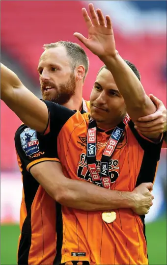  ??  ?? David Meyler and Jake Livermore of Hull City celebrate the play-off final victory.